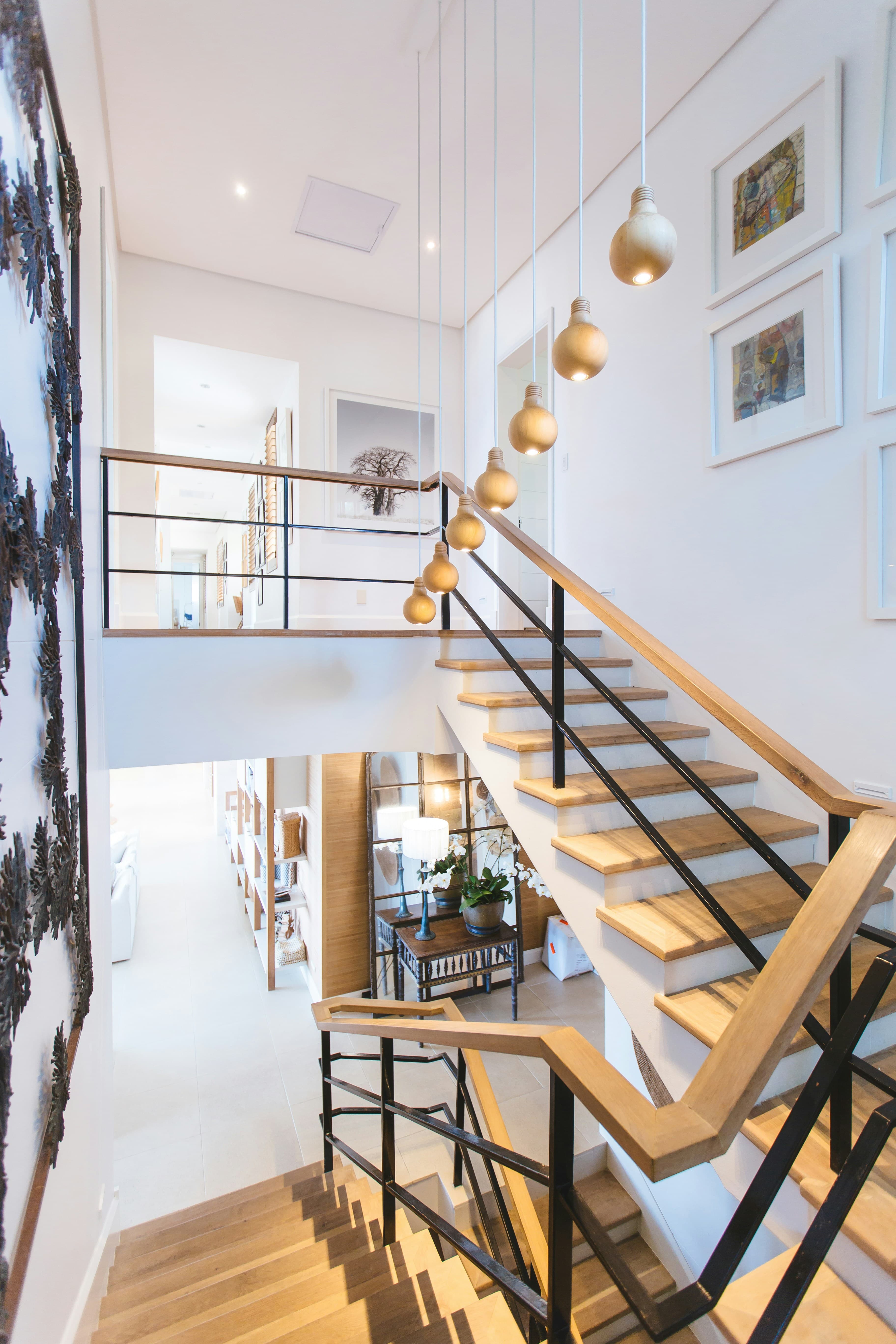 Bright, uncluttered stairway and landing inside a home